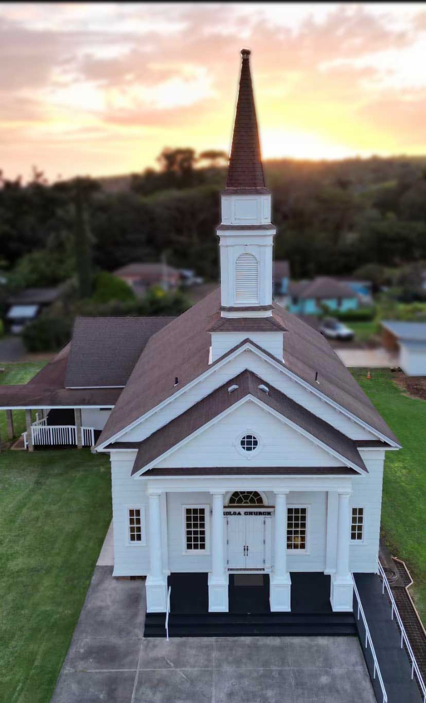 Drone footage of the front of The Church at Koloa taken just before sunset.
